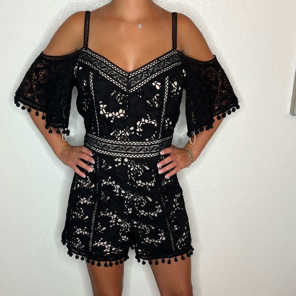 Never worn black and tan nice romper.